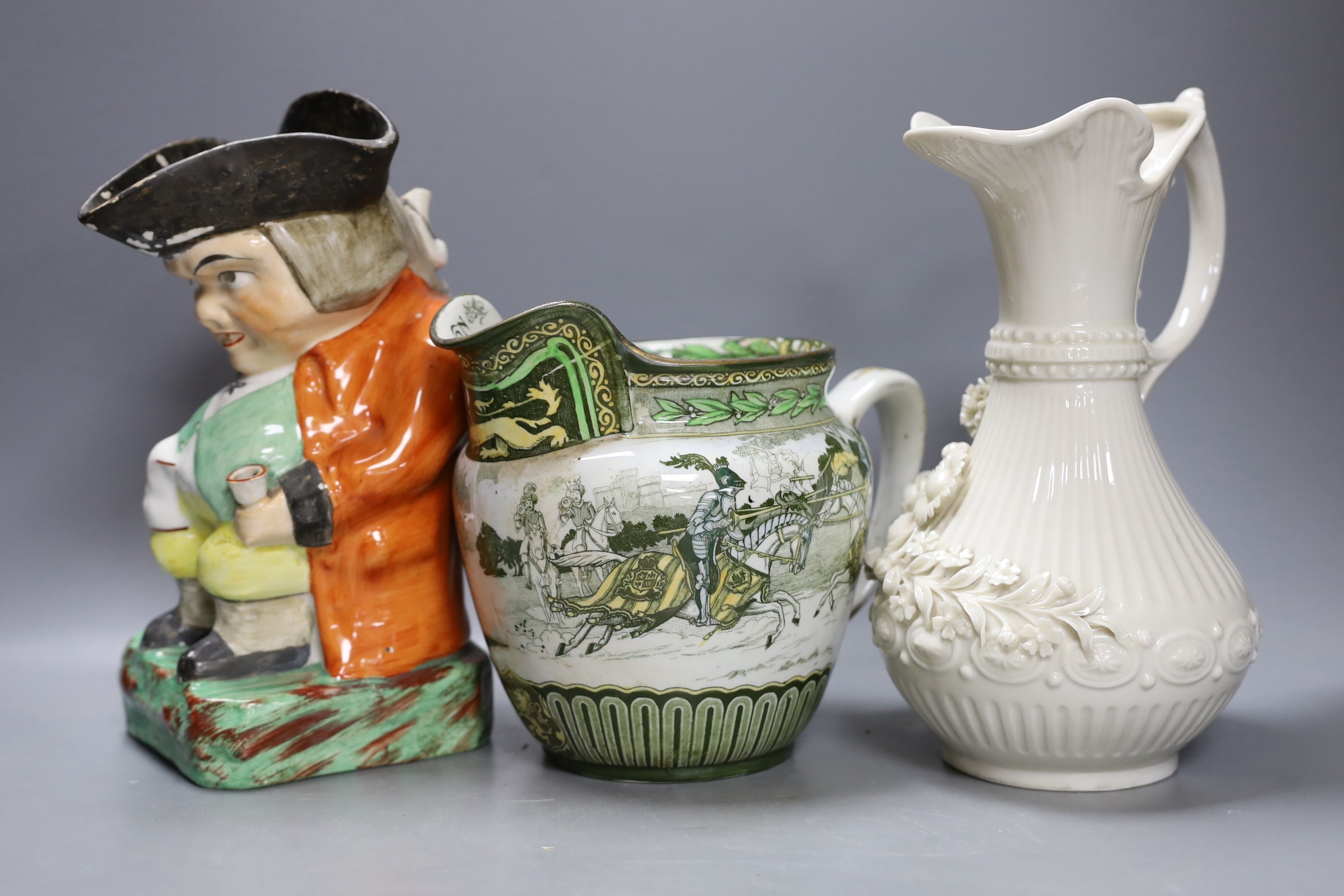 An early 19th century Staffordshire pearlware Night Watchman character jug, a Belleek ewer, a Staffordshire figure of a Dalmatian dog, a Royal Doulton jug and two other items, tallest 23cm (6)